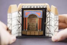 Image of actors in a tiny Globe theatre from a miniature book at UVA. Photo credit Shane Lin, Courtesy of Albert and Shirley Small Special Collections Library. Used under CC 2.0.